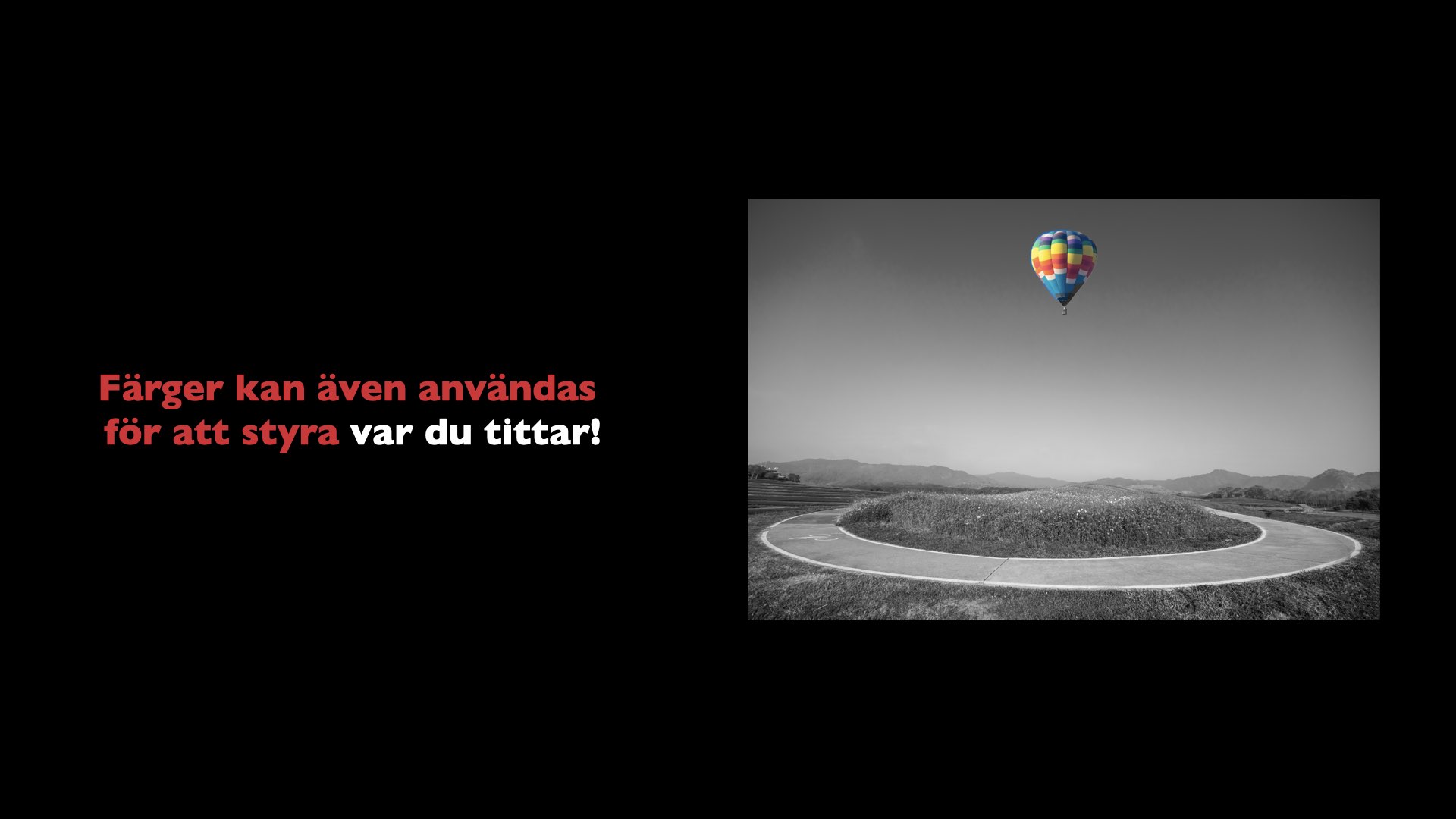 Slide med svartvit bild av landskap där bara en luftballong är i färg — den drar omedelbart till sig blicken.
